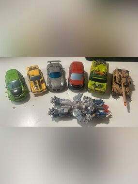 Hasbro Transformers toys - Ratchet, Skids, Mudflap, Brawl, Jazz, Megatron